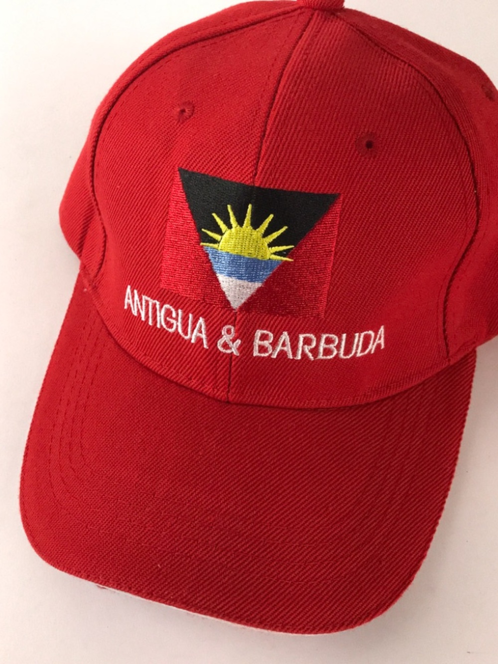 Antigua & Barbuda red hat sun flag